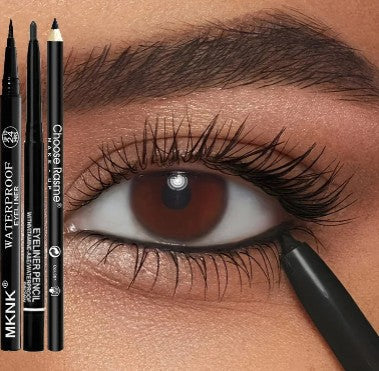 A close-up of a brown eye with black eyeliner being applied to the lower lash line. Two black eyeliner pencils are shown next to the eye.